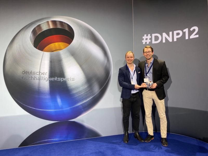 Philipp and Lukas holding award Philipp and Lukas holding award